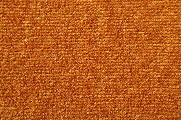 bright orange wool texture and bakground. Texture of a carpet or fabric
