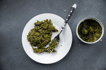 canned spinach healthy meal food snack on the table copy space food background rustic top view keto or paleo diet veggie vegan or vegetarian food