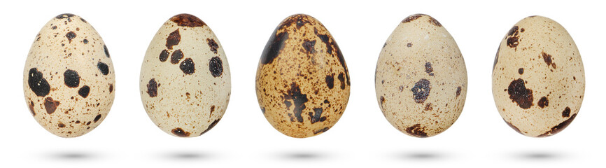 Quail eggs on a white isolated background. Natural ecological food. Quail eggs of natural spotted...
