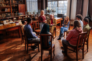 Woman talking in group mental health session.