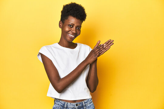 Elegant African Woman, Short Hair, White Tank Top, Elegant African Woman, Short Hair, White Tank Topfeeling Energetic And Comfortable, Rubbing Hands Confident.