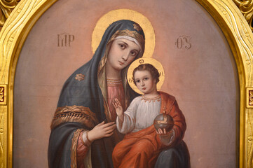 An Icon of the Mother of God with Infant Jesus. The Greek-Catholic Church of the Dormition of the Mother of God in Čemerné, Slovakia. 2023/02/05. - obrazy, fototapety, plakaty