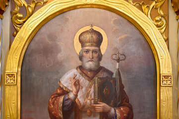 An Icon of Saint Nicholas of Myra (also known as Nicholas of Bari or Nicholas the Wonderworker). The Greek-Catholic Church of the Dormition of the Mother of God in Čemern&eacute;, Slovakia. 2023/02/05.