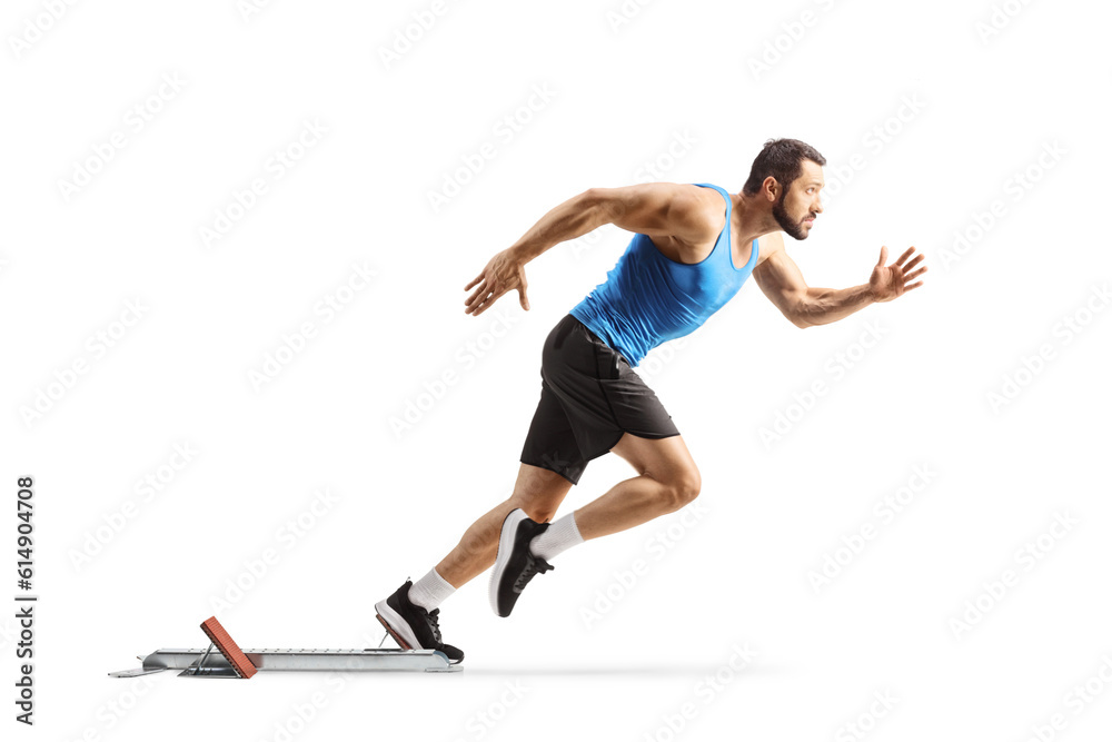 Sticker full length profile shot of a male athlete on starting blocks starting a run