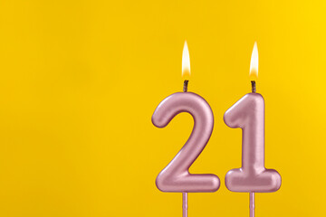 Candle 21 with flame - Birthday card on yellow luxury background