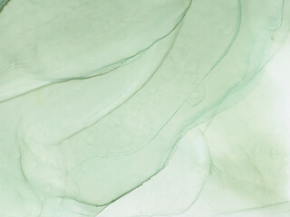 Abstract green art — green fluid background with beautiful smudges and stains made with alcohol...