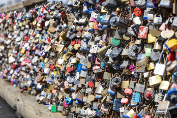 locks on the side of a bridge