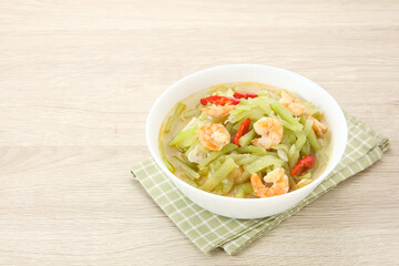 Tumis Labu Siam Udang, spicy stir fry chayote with shrimp, Indonesian traditional food
