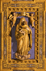 Fototapeta na wymiar NAPLES, ITALY - APRIL 20, 2023: The statue of Madonna from coffered ceiling of Basilica santuario di Santa Maria del Carmine Maggiore by Mario Coraiola (1955) as the copy of original from 16. cent.