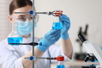 Young scientist working with samples in laboratory