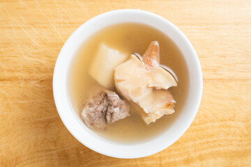 top view bowl of home cooked sliced whelk soup