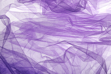 Beautiful purple tulle fabric as background, top view