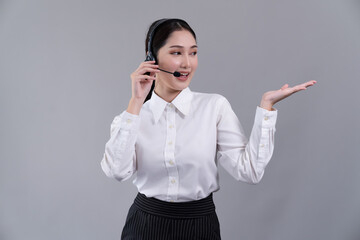 Asian female call center operator with smile face advertises job opportunity, wearing a formal suit...