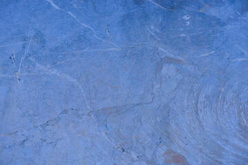 Dirty blue stone wall pattern texture background.