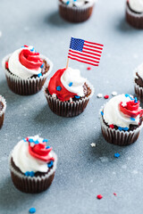 Independence Day Fourth of July USA American patriotic party with american symbols. Cupcakes dessert decorated cream cheese or buttercream.
