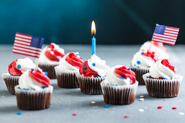 Independence Day Fourth of July USA American patriotic party with american symbols. Cupcakes dessert decorated cream cheese or buttercream.