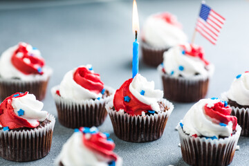 Independence Day Fourth of July USA American patriotic party with american symbols. Cupcakes dessert decorated cream cheese or buttercream.