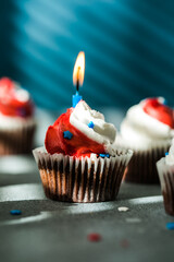 Independence Day Fourth of July USA American patriotic party with american symbols. Cupcakes dessert decorated cream cheese or buttercream.