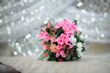 Brides wedding bouquet on chair. Selective focus.