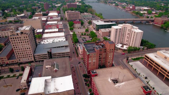 Striking aerial of Rockford Illinois downtown in the summer.  Industrial city in northern Illinois. Aerial 4k USA.