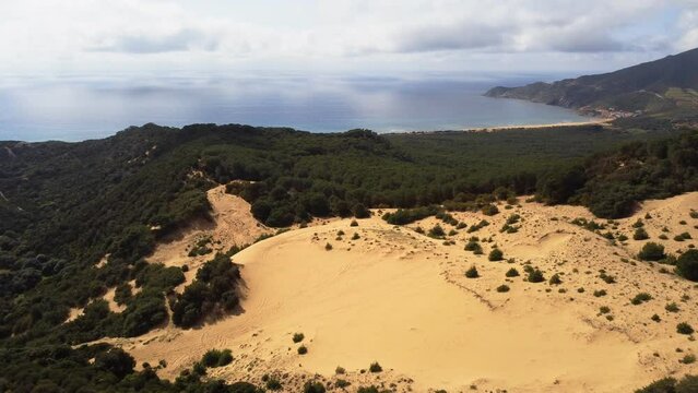 Buggerru coast in South Sardinia, view of sand dunes by beach of portixxedu