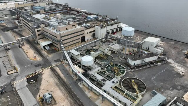 Aerial Establishing Shot Of Kimberly-Clark Manufacturing Plant In Chester, PA. The Company Manufactures Sanitary Paper Products And Surgical And Medical Instruments.