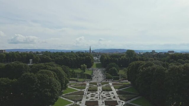 Pedestrians walk throughout Frogner Park in Oslo