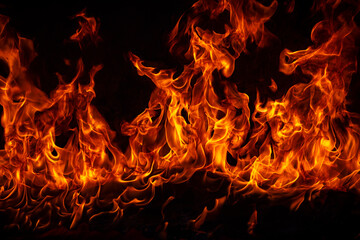 Fototapeta na wymiar Fire blaze flames on black background. Fire burn flame isolated, abstract texture. Flaming explosion with burning effect. Fire wallpaper, abstract art pattern.