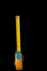 tape measure isolated on black background