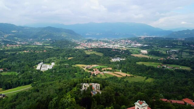 Aerial drone flyback view of Santa Maria or Madonna del Carmelo sanctuary of Montevecchia in Como province, Italy
