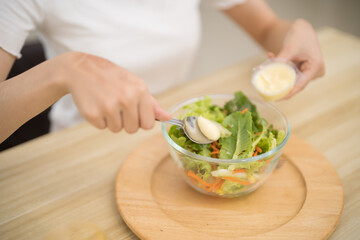 Asian woman dieting Weight loss eating fresh fresh homemade salad healthy eating concept