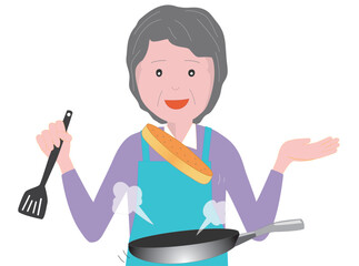 高齢者の女性がフライパンで料理をしている。