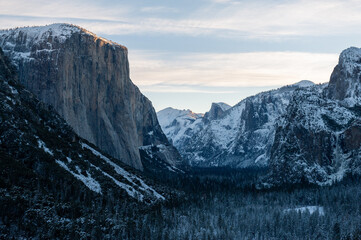 Panoramic view of a snow-covered Yosemite Valley, at Dawn.