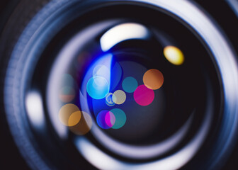 Colorful lens bokeh: a mesmerizing blend of vibrant, blurred lights, creating a dreamy, whimsical atmosphere that enchants the senses