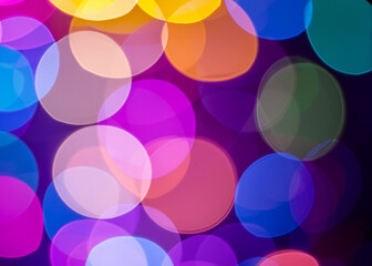Colorful bokeh: a mesmerizing blend of vibrant, blurred lights, creating a dreamy, whimsical atmosphere that enchants the senses
