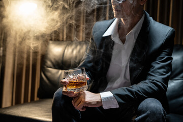 Businessmen in suits drinking  Celebrate whiskey.