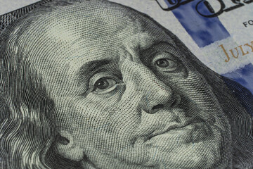 Close up of hundred dollar bill. Macro close up of Ben Franklin. 100 dollar bill. financial concept.