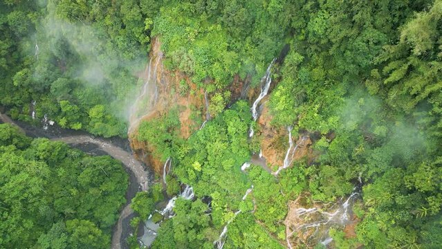 Aerial view of Goa Tetes waterfall. Lumajang Province, East Java, Indonesia