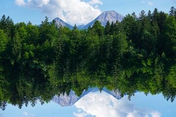 Mirrored mountains with sky in bavaria