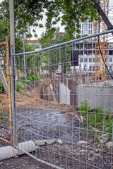 Construction site of a residential apartment building on a summer day