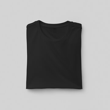 Template of a folded men's black t-shirt with a label, close-up front view, fashion clothes, for design, print.
