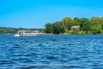 Excursion boat on the Greater Wannsee to peacock island in the Havel river in Berlin. River cruise from Potsdam to Berlin is a big tourist attraction of both cities