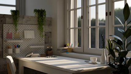 Copy space on a white wooden table against the window in a minimalist home workspace