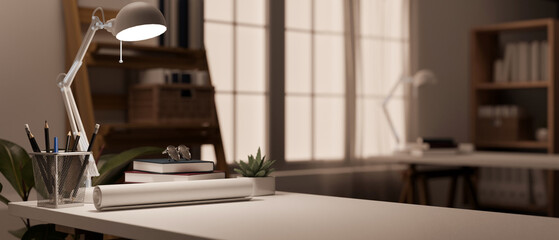 Close-up image of an architect or engineer's office desk in a modern office room