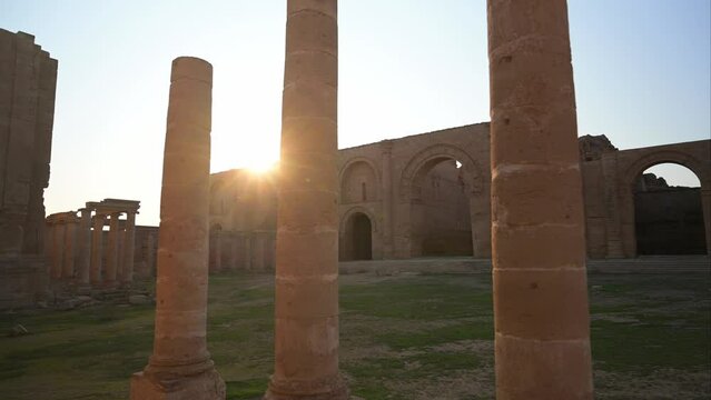 Ancient Rock Columns and Stone Arches at Hatra Ruins in Iraq, Archaeology Outdoor Site at Sunset 