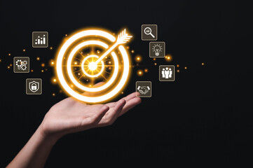 Businessman showing target virtual darts icon arrow. Goal concept for business investment. marketing strategy	
