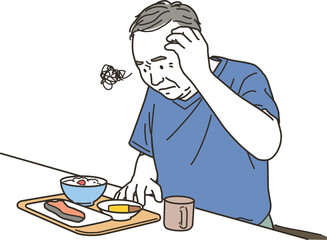 食事の前で困る高齢者のシニア男性