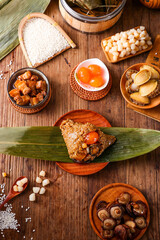 zongzi, rice dumplings,Made with glutinous rice and meat or egg yolk(Dates and Red Beans), wrapped in zong leaves, a common food for the Dragon Boat Festival in Asian countries.