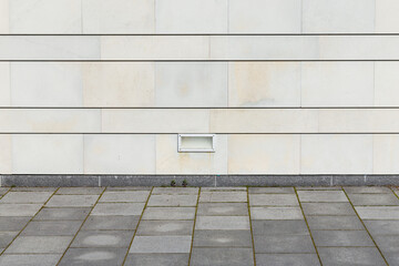 square floor with modern stone wall