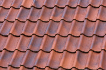 Red tiles roof background